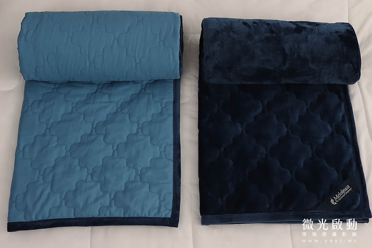 焦糖色皮革床頭靠墊，搭配橘色針織毯，豐富色彩與材質，提升視覺質感